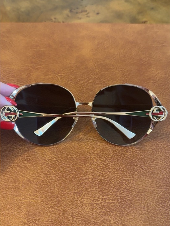 Gucci Sunglasses GG0225S. Gold frame with green and red GG detail main image 6